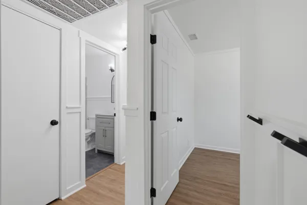 a view of a bathroom from the hallway