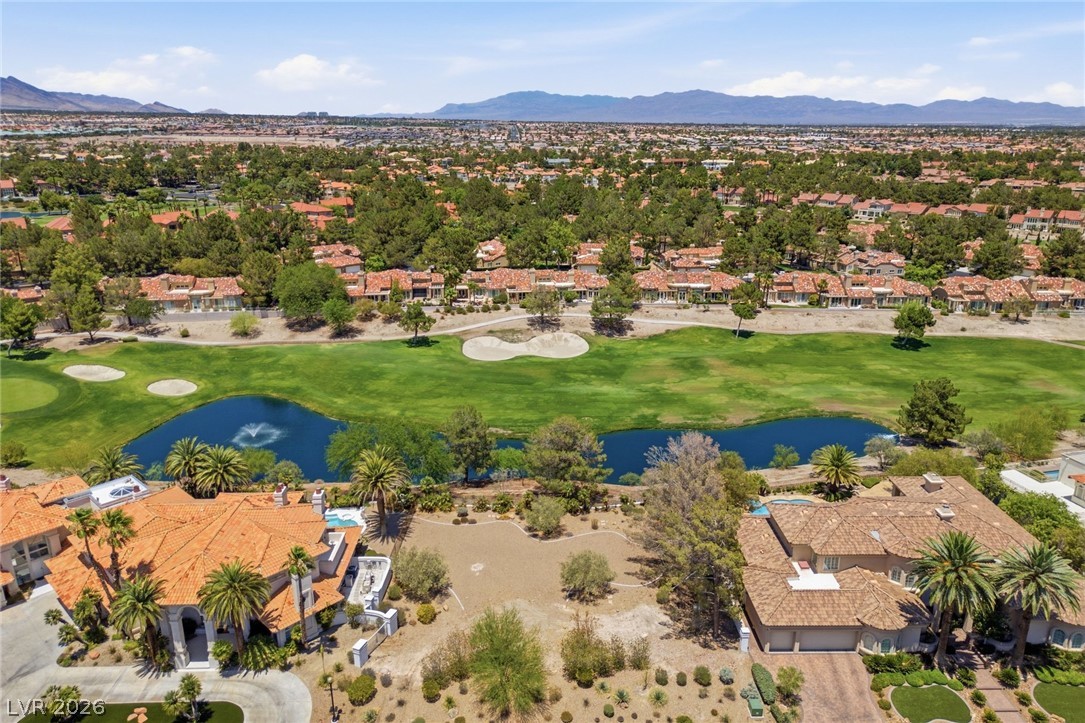 20 Innisbrook Avenue Las Vegas, NV 89113 - Photo 1 of 39 Overlooking the vibrant golf course and serene water feature, this residence offers an exceptional natural panorama.