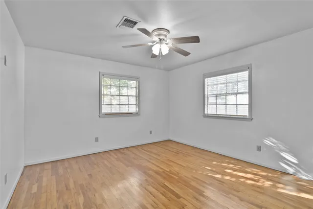 a view of a window in an empty room