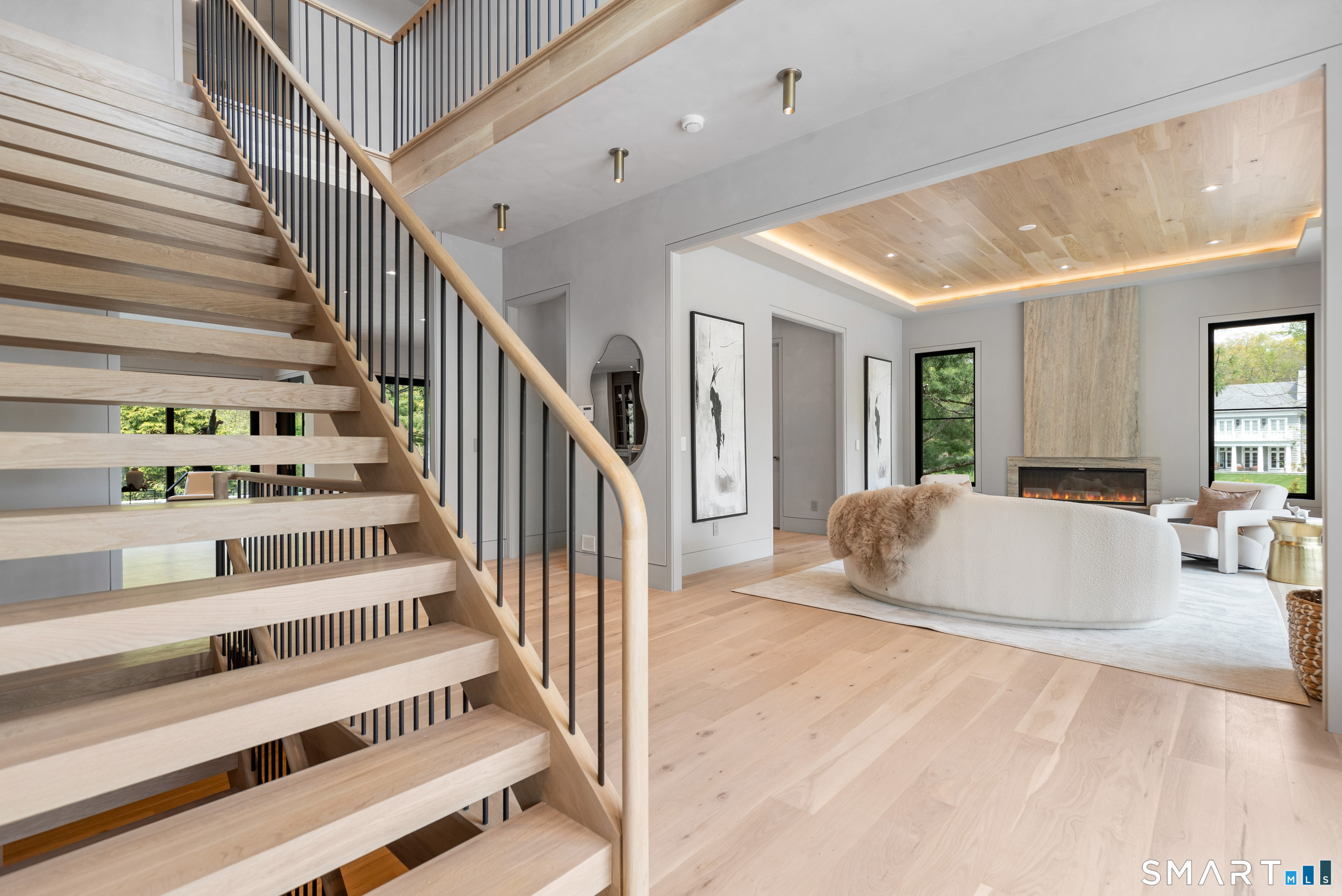 259 Frogtown Road New Canaan, CT 06840 - Photo 6 of 39 a view of staircase with white walls and windows