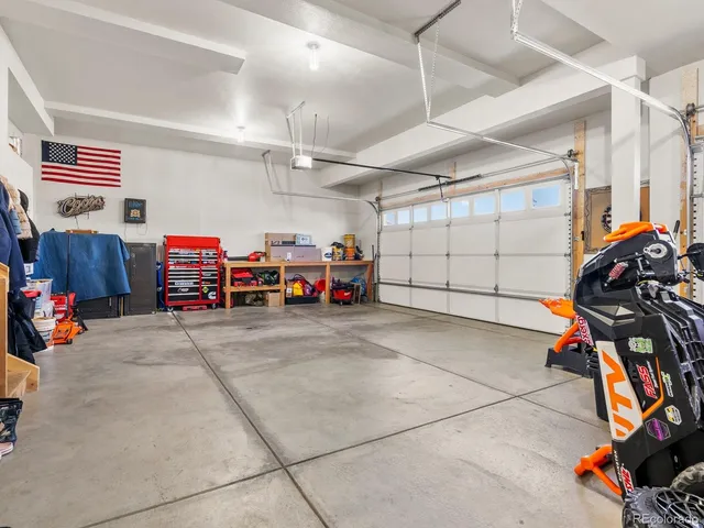 a view of a garage with storage