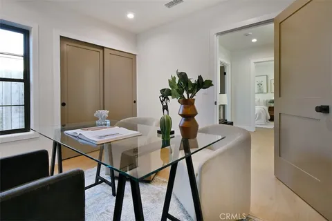 a view of a livingroom with furniture and window