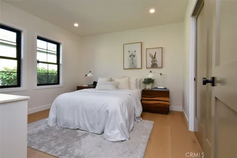 a view of a bedroom and a bedroom bathroom