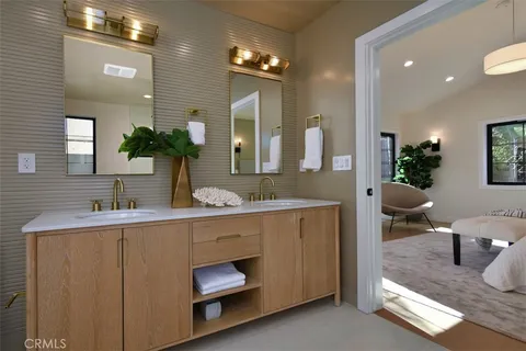 a bathroom with a toilet and a sink