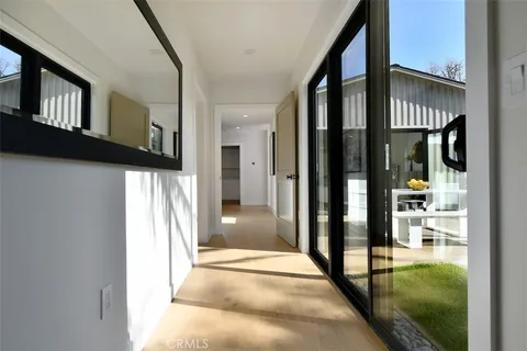 a view of hallway with stairs