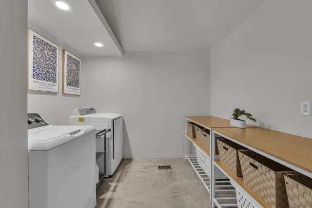 a bathroom with a toilet a sink and a mirror