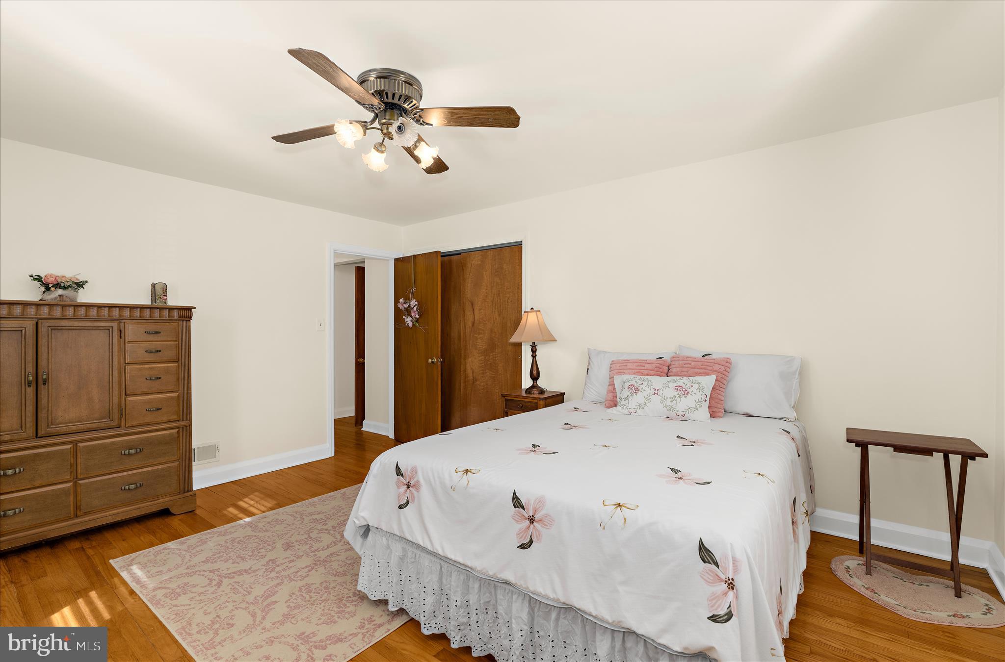 534 Cleveland Road Linthicum Heights, MD 21090 - Photo 11 of 30 a bedroom with a bed and dresser