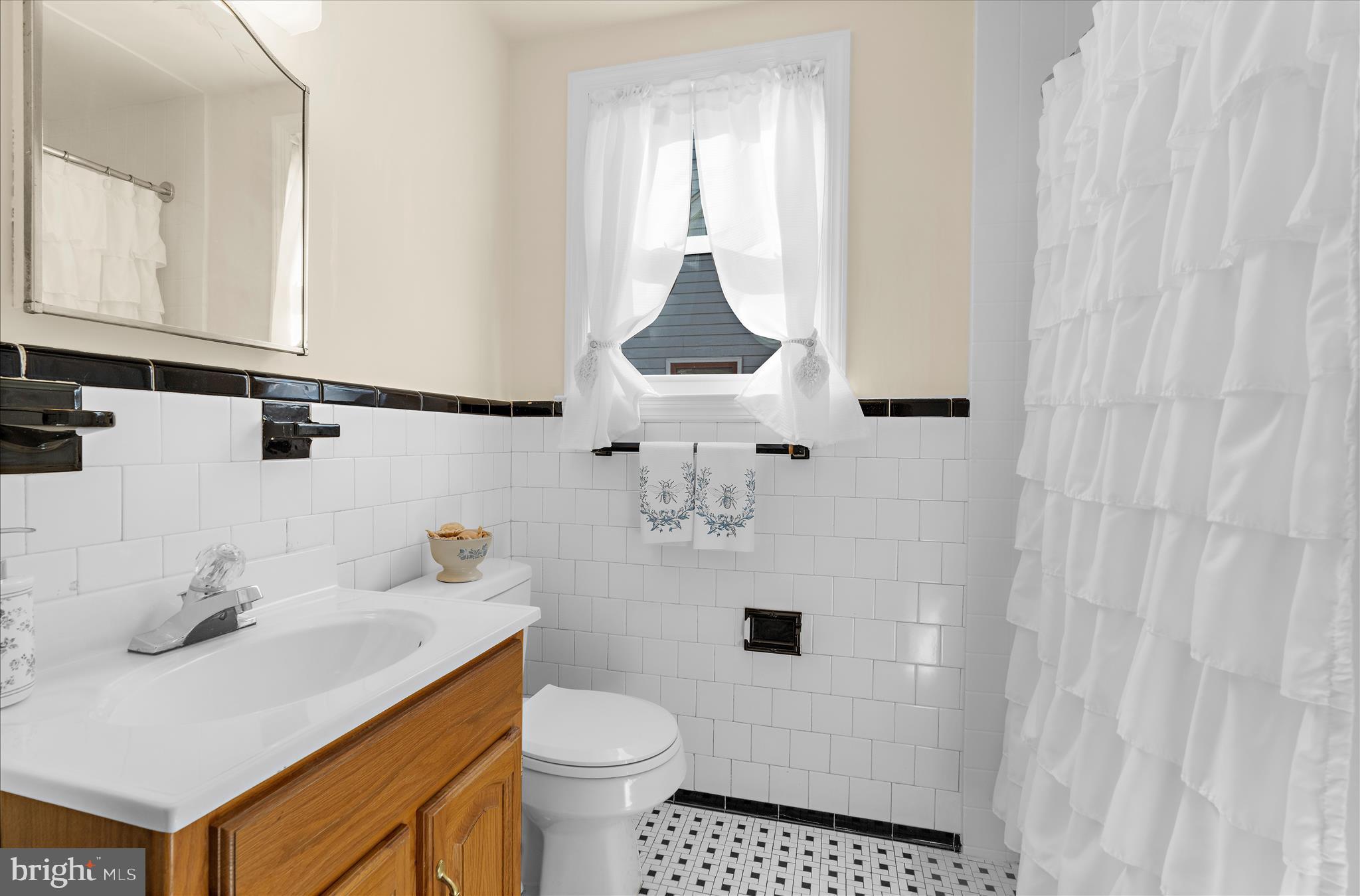 534 Cleveland Road Linthicum Heights, MD 21090 - Photo 14 of 30 a bathroom with a sink toilet and shower