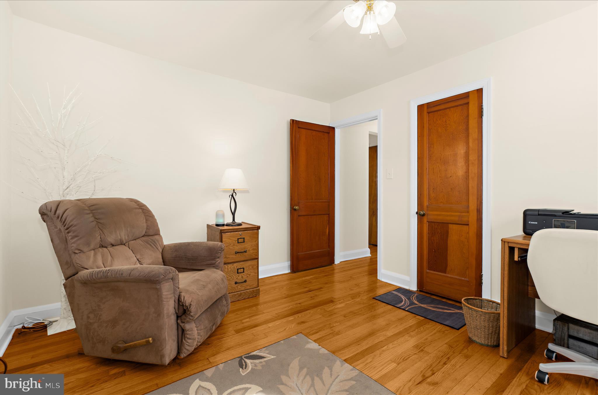 534 Cleveland Road Linthicum Heights, MD 21090 - Photo 16 of 30 a living room with furniture and a dresser