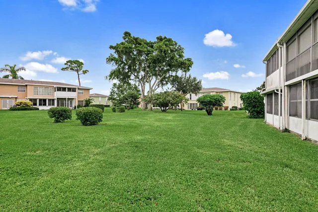 a view of a house with a street