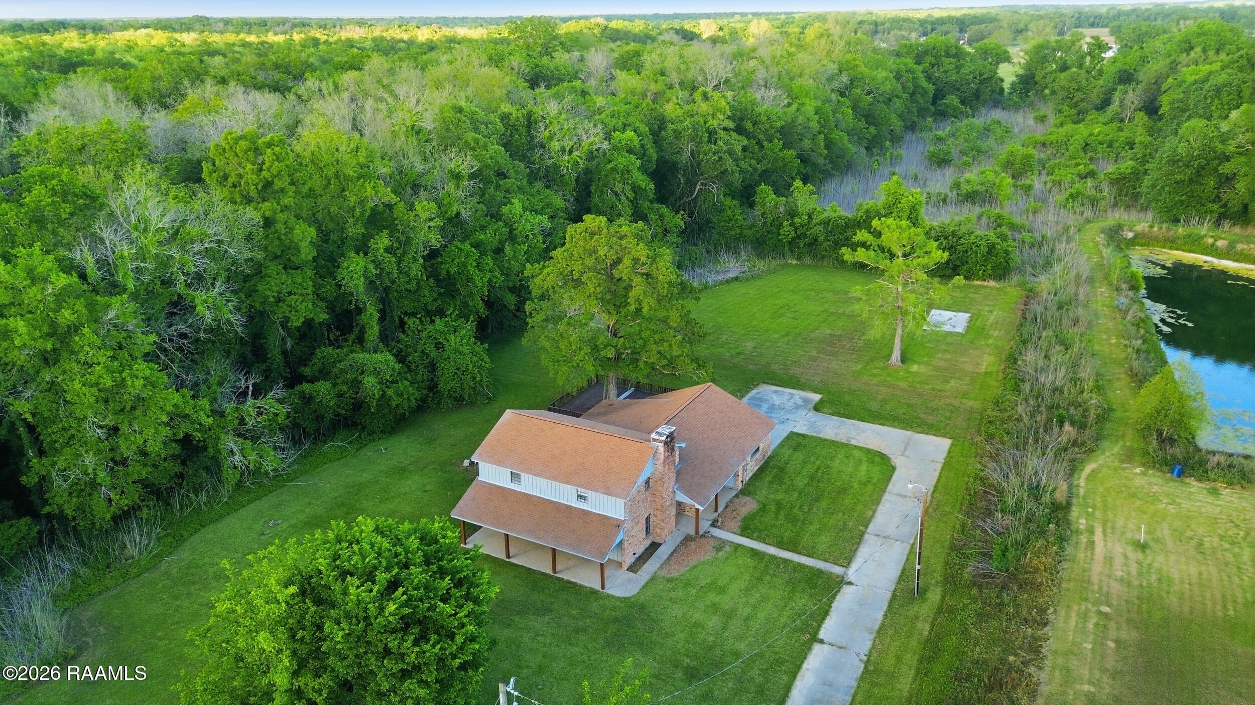 156 Magnifique Road Breaux Bridge, LA 70517 - Photo 25 of 32 26_002_dji_fly_20260415_181748_452_17762