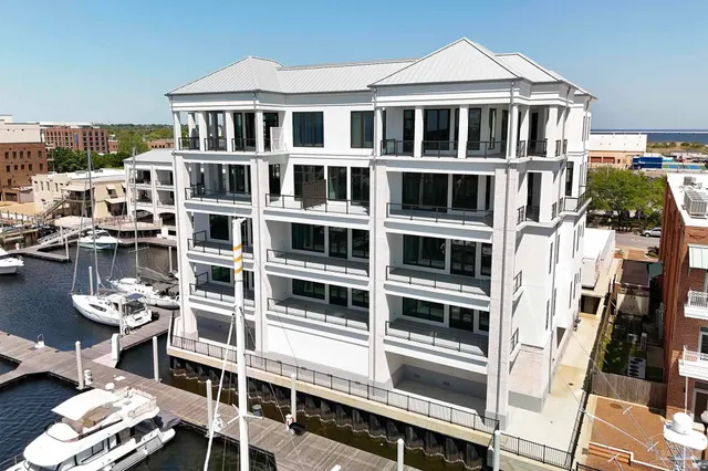 a front view of a building with glass windows