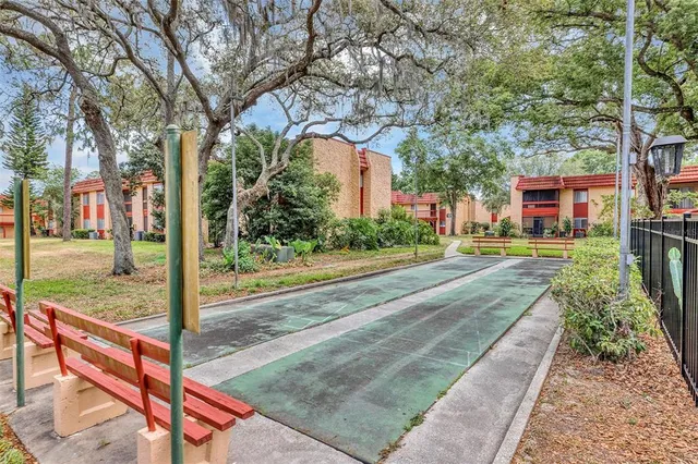 a view of a swimming pool with a patio