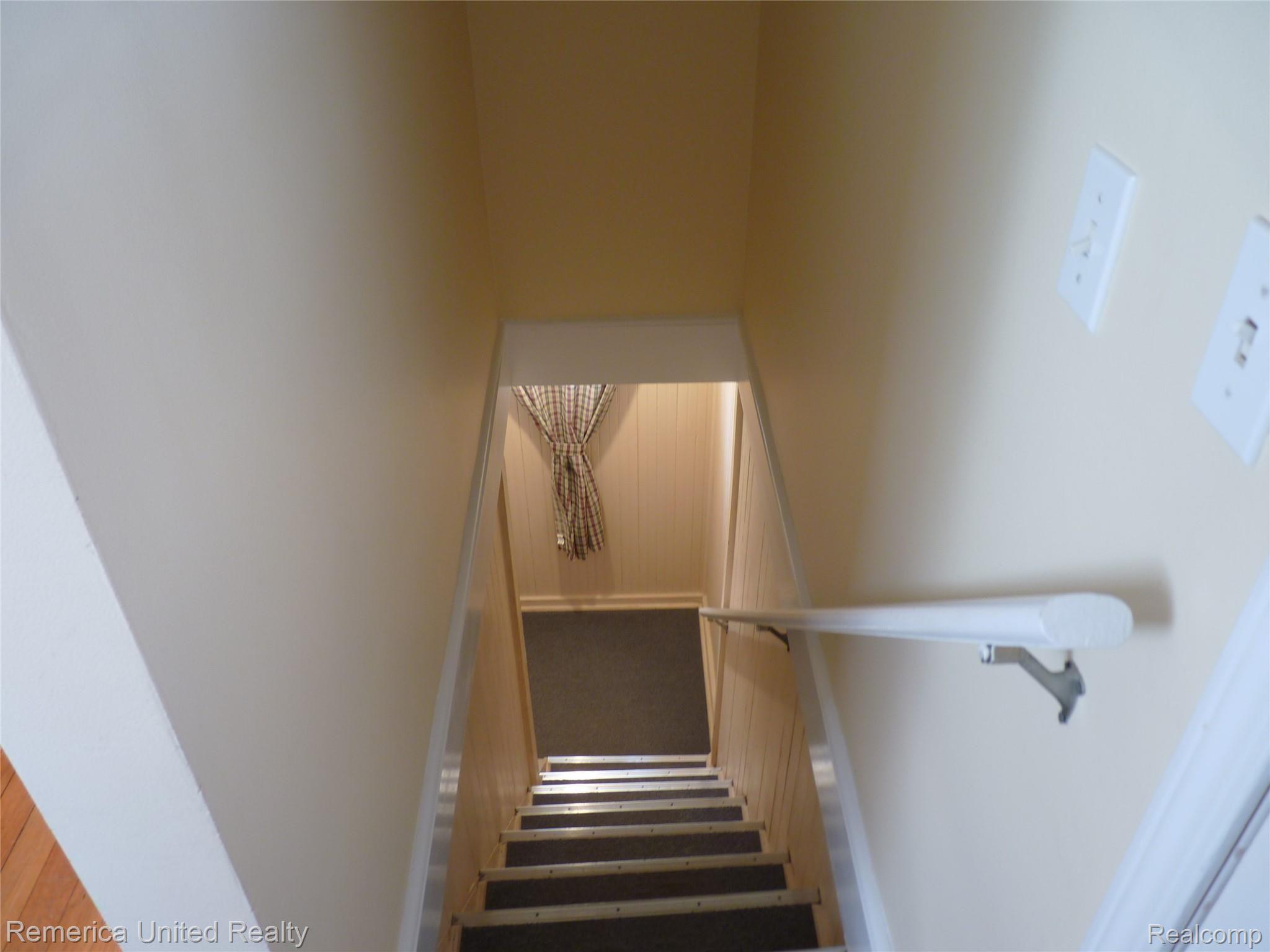 945 Old Plank Road Milford, MI 48381 - Photo 18 of 26 LOWER LEVEL STAIRS