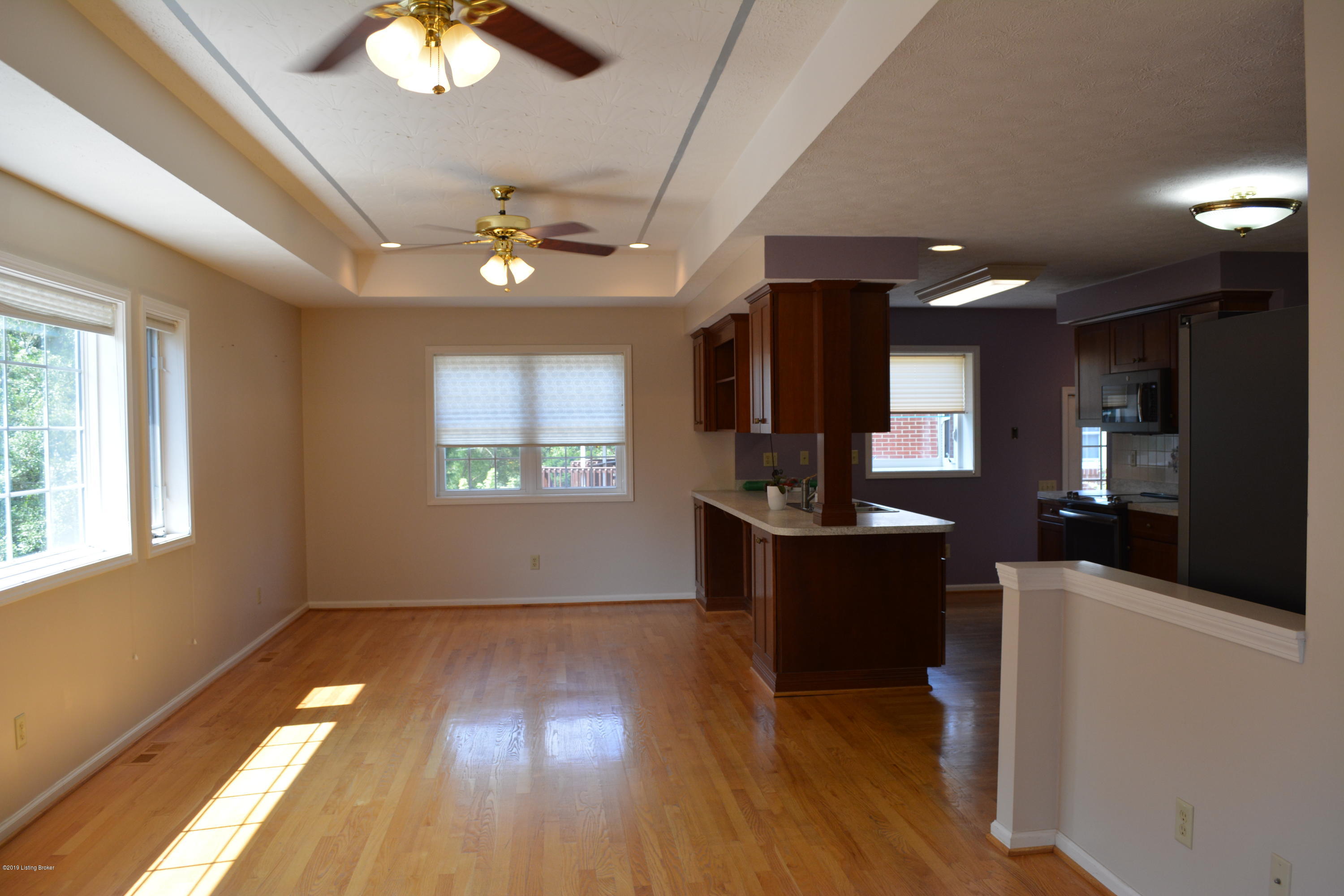 8223 Delido Road Louisville, KY 40219 - Photo 20 of 64 Same room open TV/Dining area
