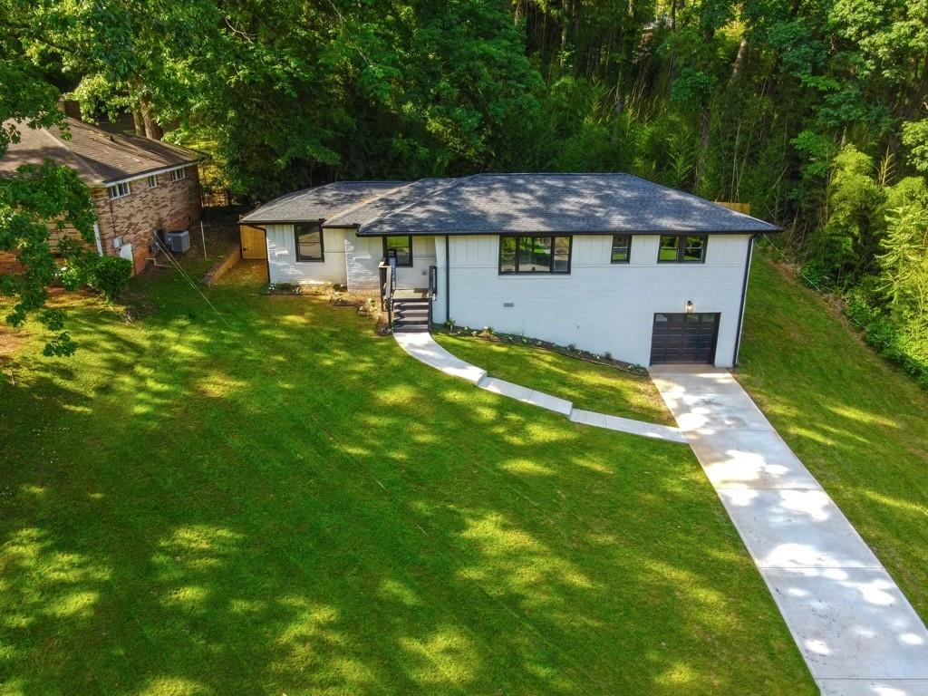 2810 Rockcliff Road Southeast Atlanta, GA 30316 - Photo 1 of 1 a view of a house with a yard