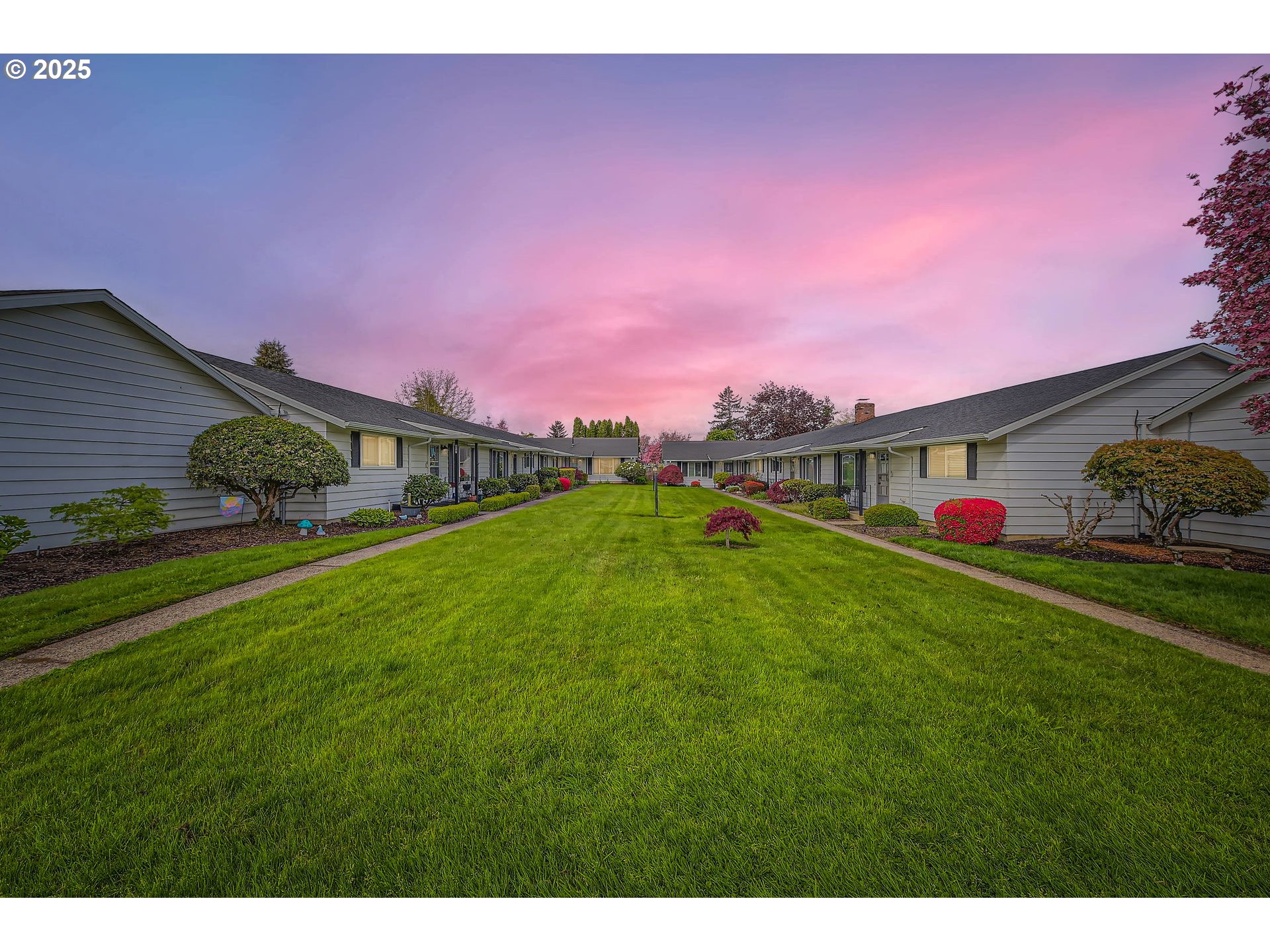 863 Northeast Fleming Avenue, Unit B10 Gresham, OR 97030 - Photo 1 of 40 a front view of a house with a yard and potted plants