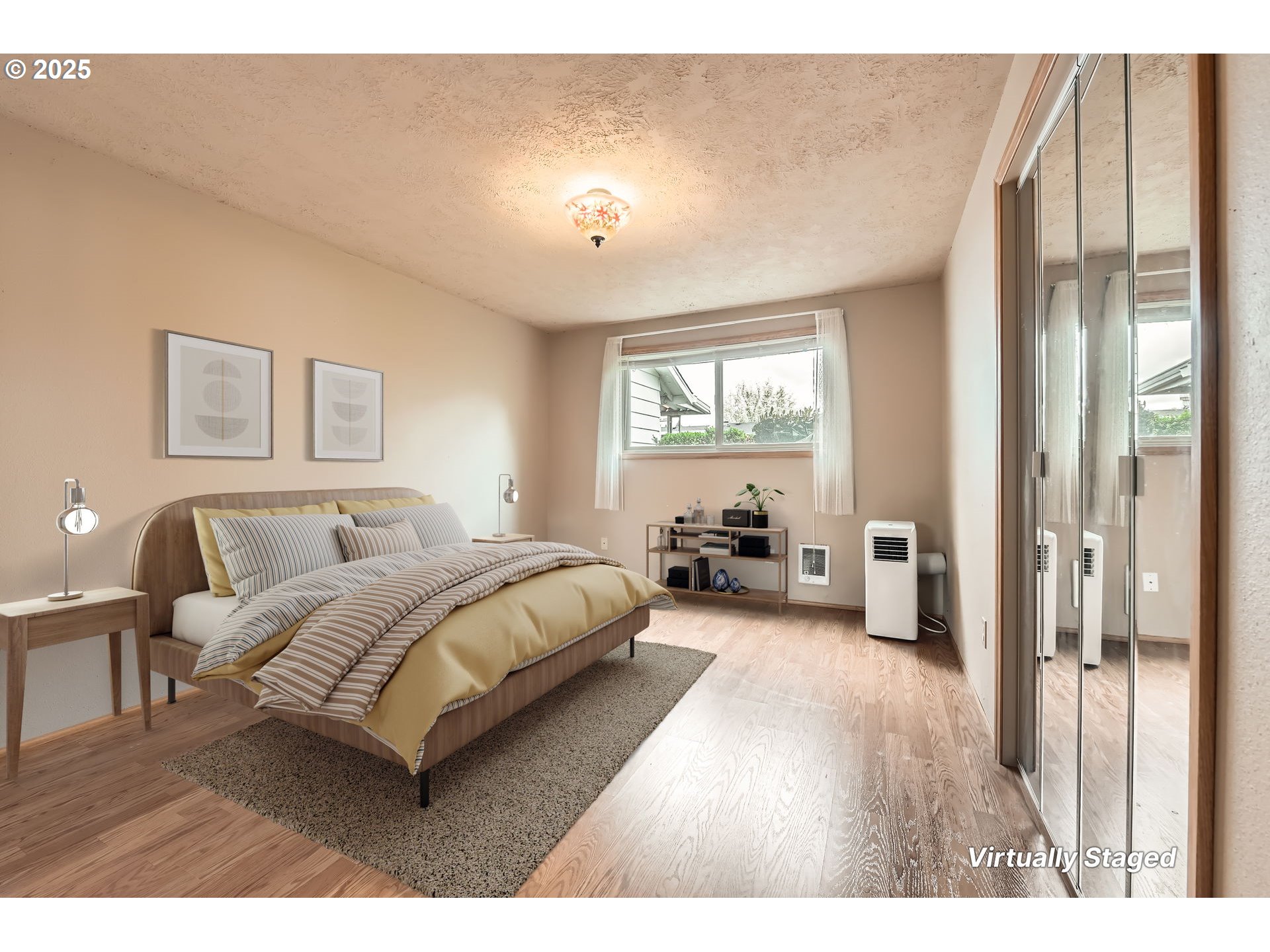 863 Northeast Fleming Avenue, Unit B10 Gresham, OR 97030 - Photo 13 of 38 a spacious bedroom with a bed and a large window