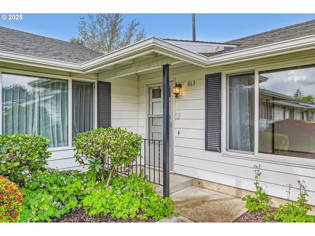 front view of a house with a small yard