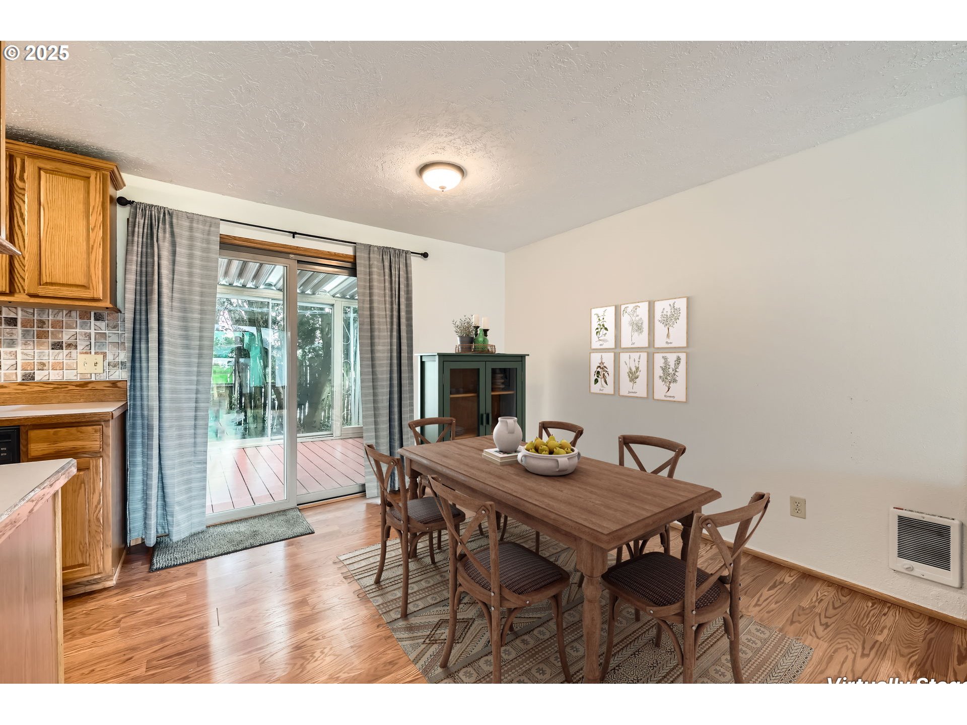 863 Northeast Fleming Avenue, Unit B10 Gresham, OR 97030 - Photo 8 of 38 a dining room with furniture and wooden floor