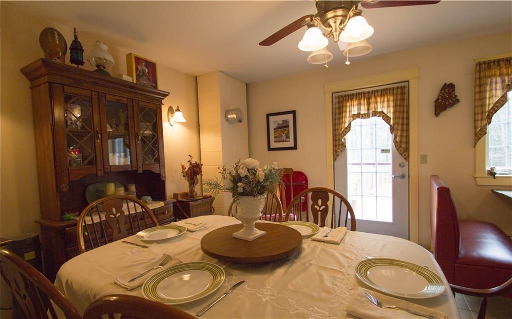 43 South Dondero Road Chelsea, ME 04330 - Photo 12 of 26 Dining room with door leading to deck.