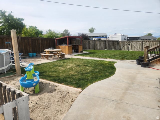 705 North 700 East Payson, UT 84651 - Photo 23 of 30 Fenced backyard with a patio area