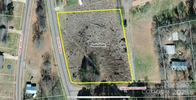 a street sign on a pole on a street