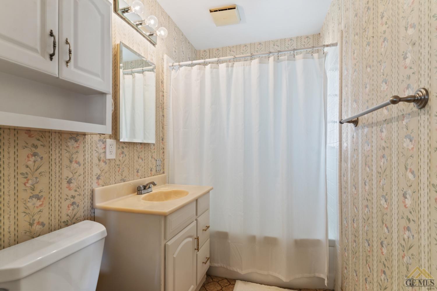 Undisclosed Address Bakersfield, CA 93304 - Photo 19 of 30 a bathroom with a sink and a tub