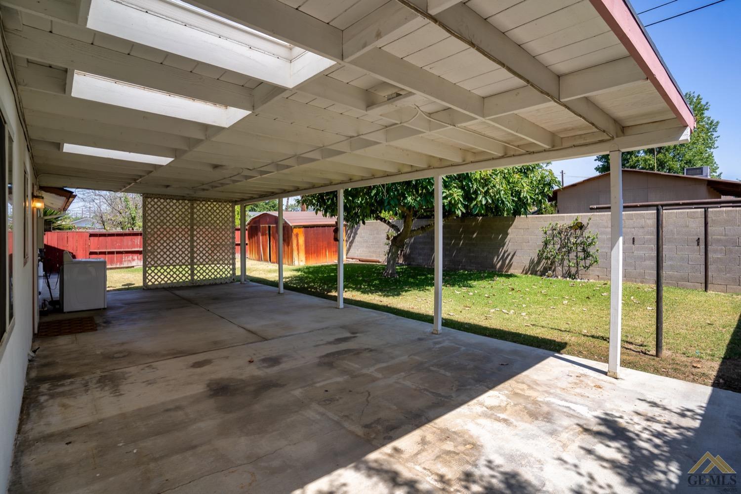 Undisclosed Address Bakersfield, CA 93304 - Photo 27 of 30 a view of an house with backyard