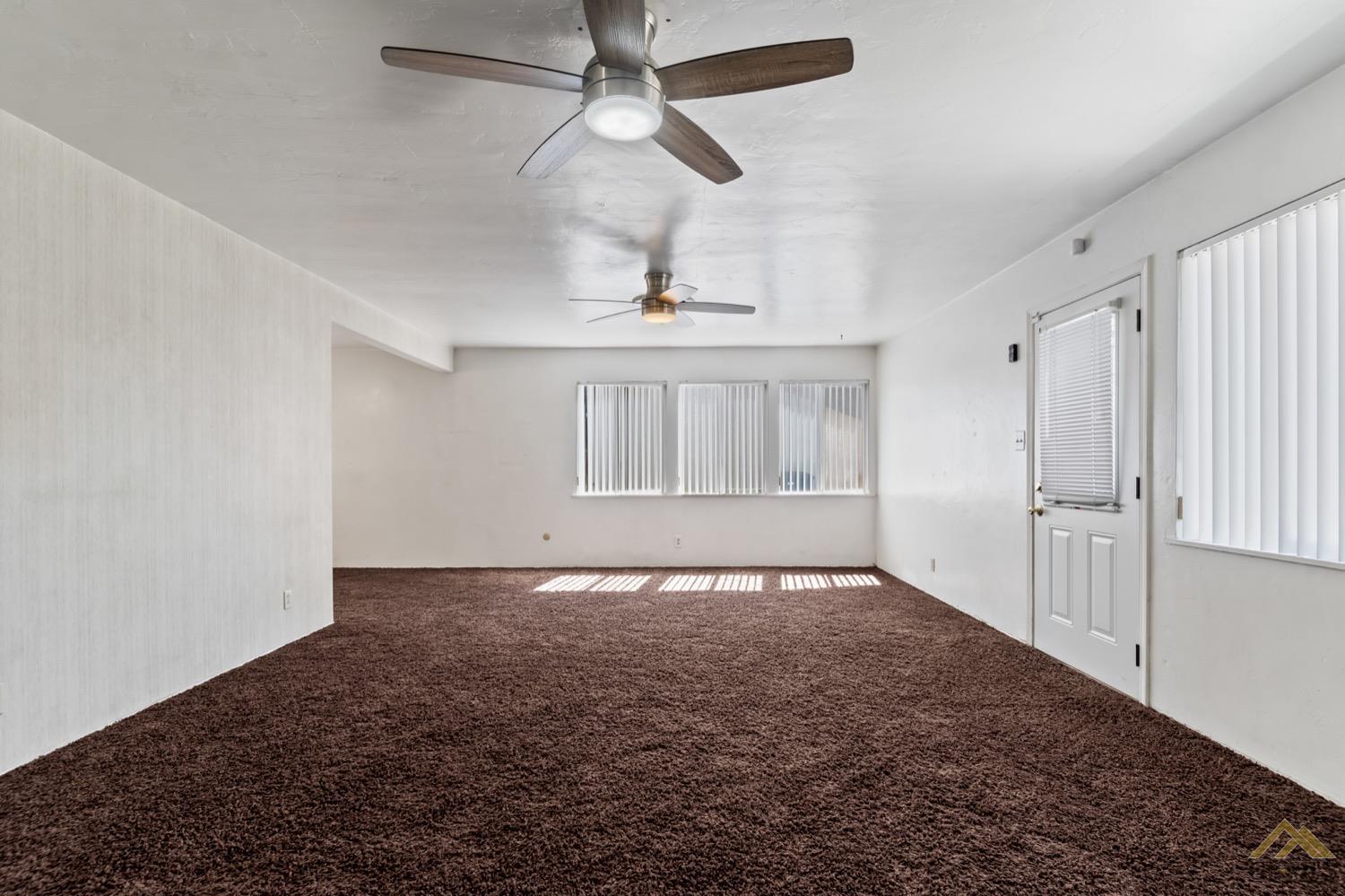 Undisclosed Address Bakersfield, CA 93304 - Photo 7 of 30 a view of an empty room with a window