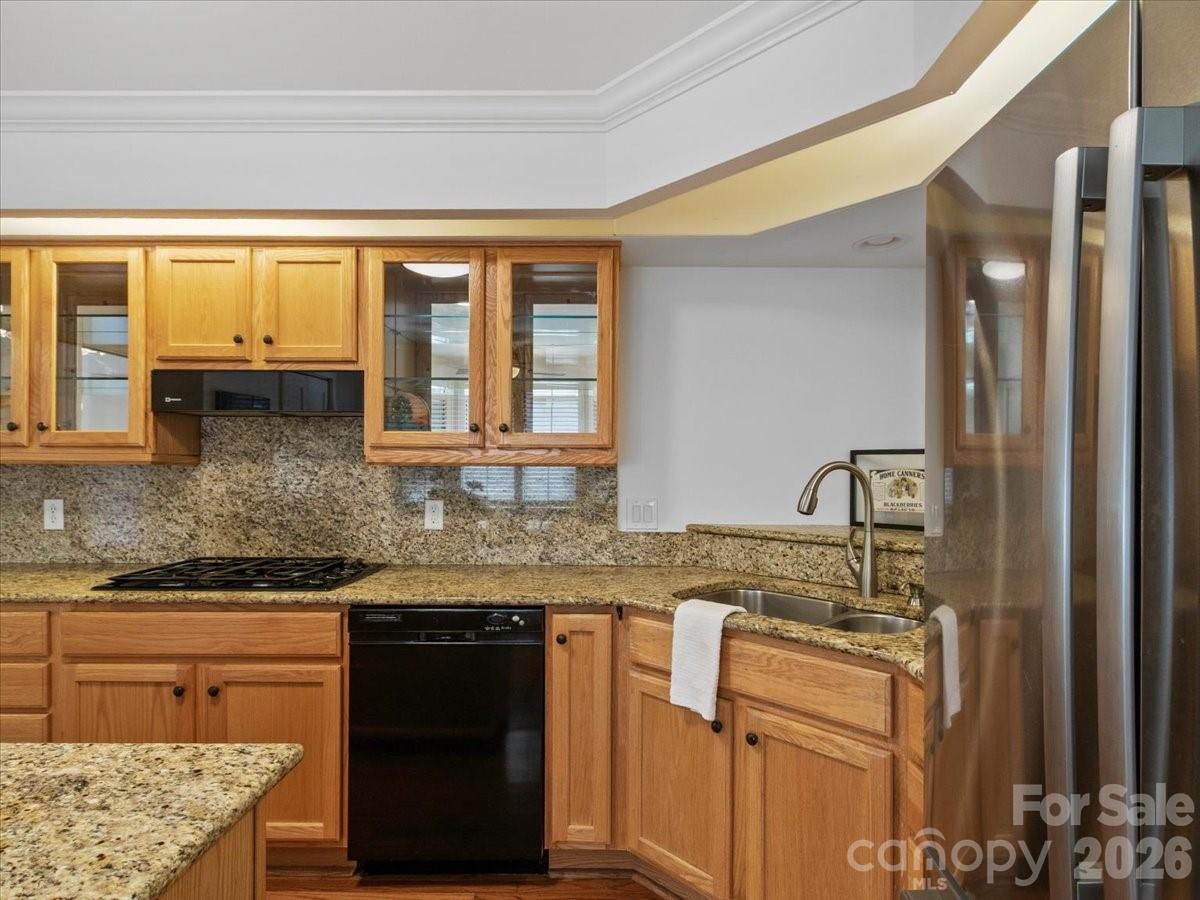 21 Ridge Terrace Asheville, NC 28804 - Photo 14 of 47 a kitchen with stainless steel appliances granite countertop a sink stove and cabinets
