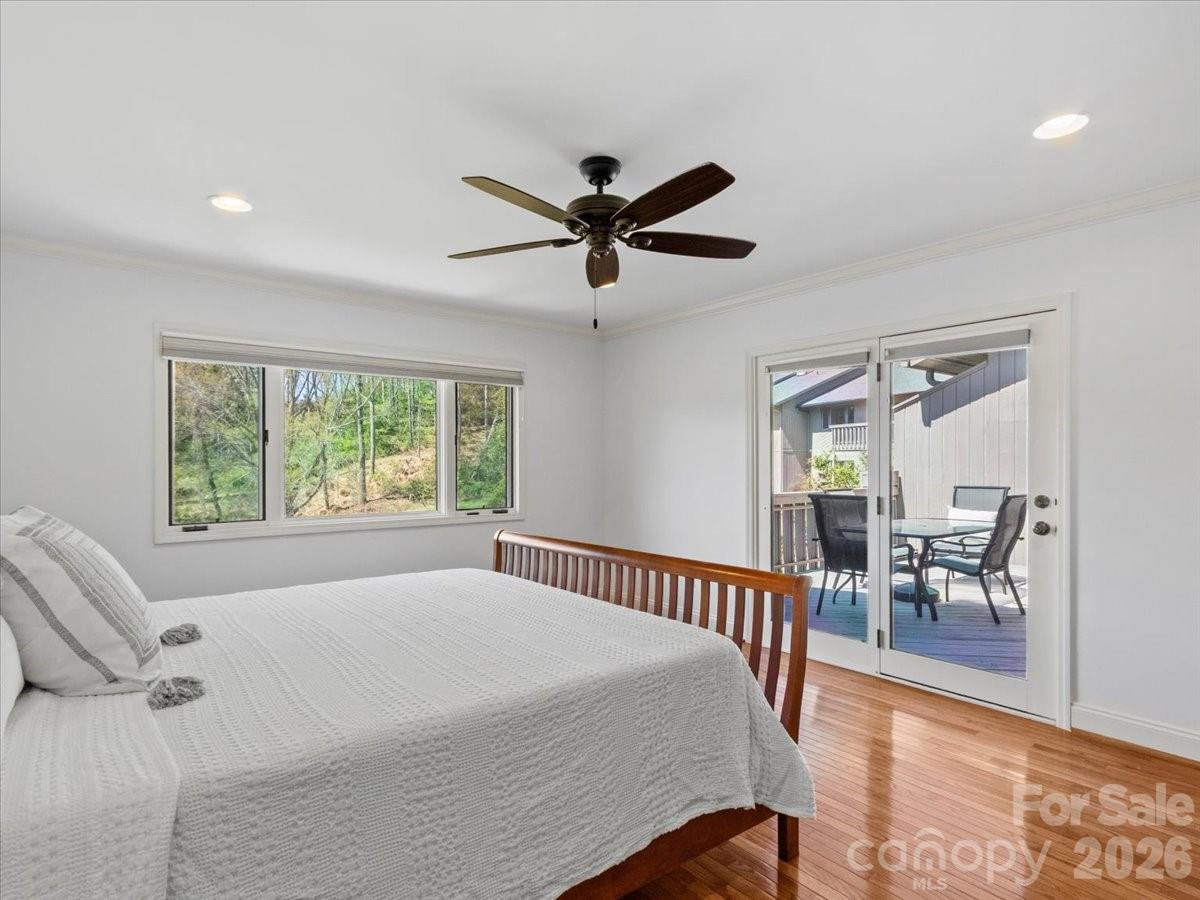 21 Ridge Terrace Asheville, NC 28804 - Photo 24 of 47 a bed room with a bed and a chair
