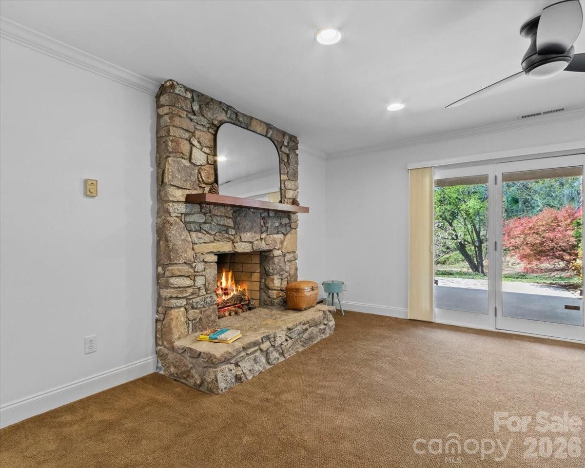 21 Ridge Terrace Asheville, NC 28804 - Photo 29 of 47 a living room with furniture and a fireplace