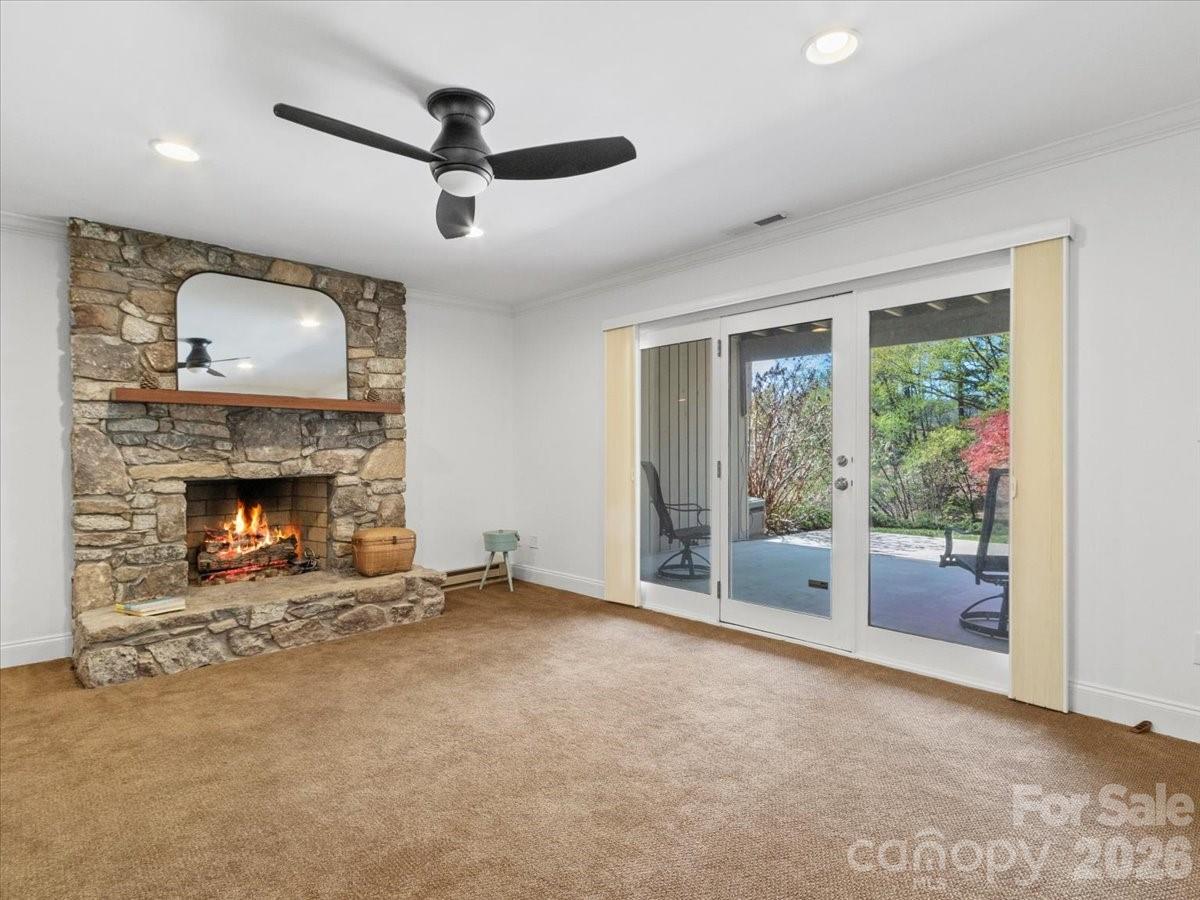 21 Ridge Terrace Asheville, NC 28804 - Photo 31 of 47 a living room with furniture and a fireplace