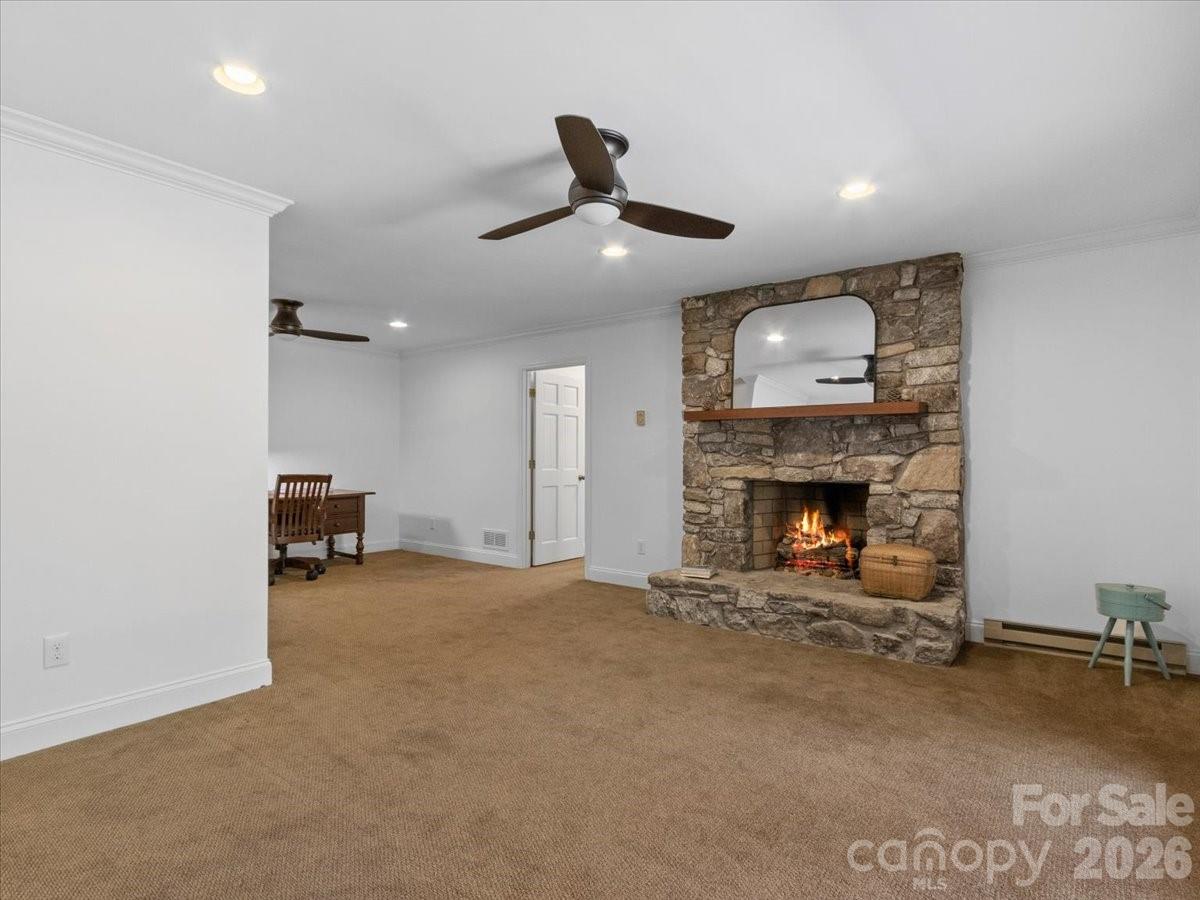 21 Ridge Terrace Asheville, NC 28804 - Photo 32 of 47 a view of an empty room with fire place and a fireplace