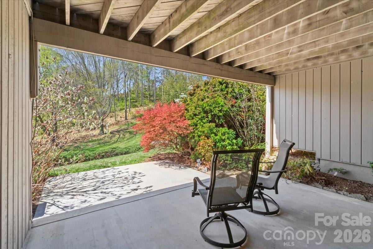 21 Ridge Terrace Asheville, NC 28804 - Photo 34 of 47 a patio with table and chairs and potted plants