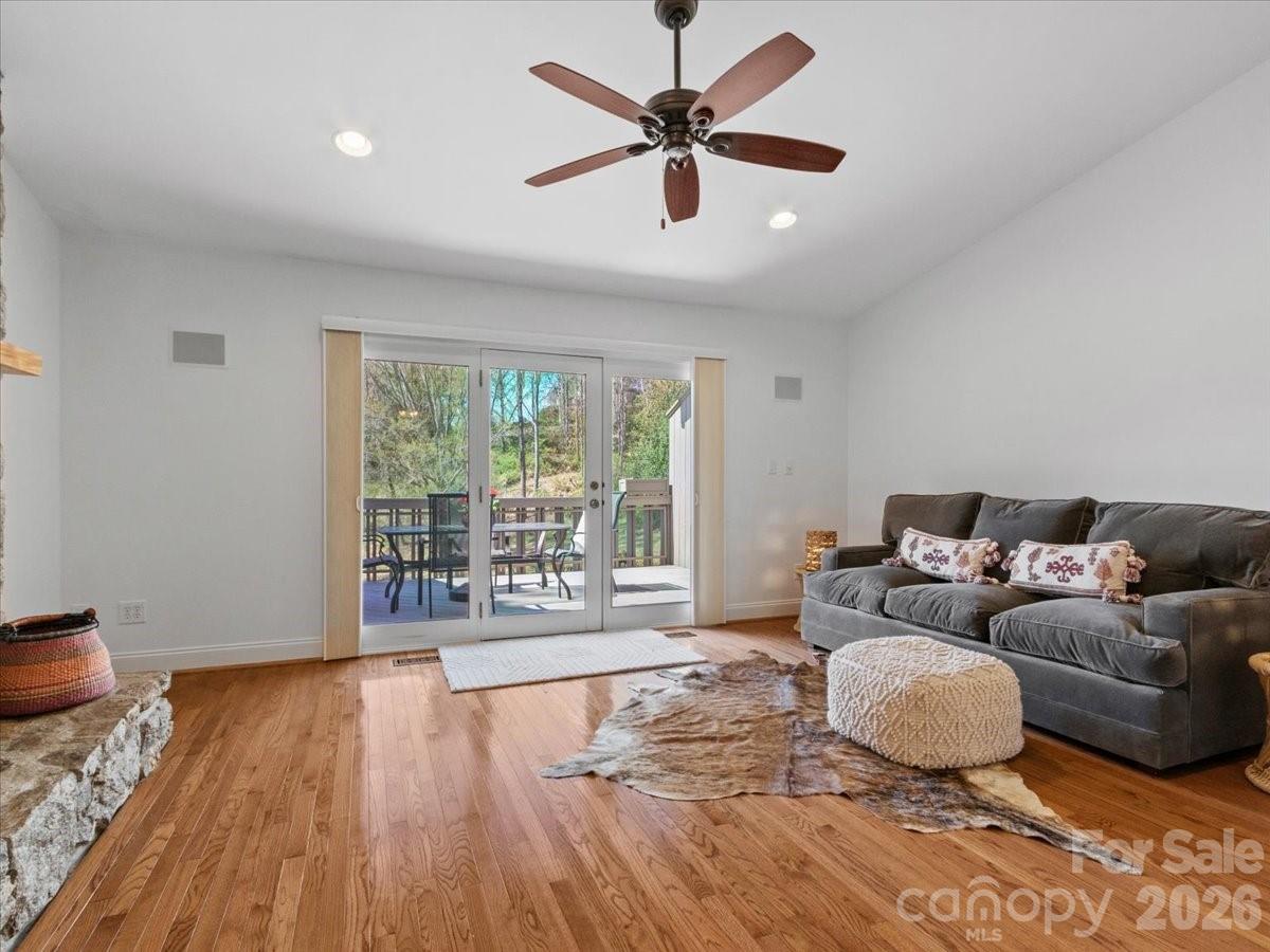 21 Ridge Terrace Asheville, NC 28804 - Photo 6 of 47 a living room with furniture and a floor to ceiling window