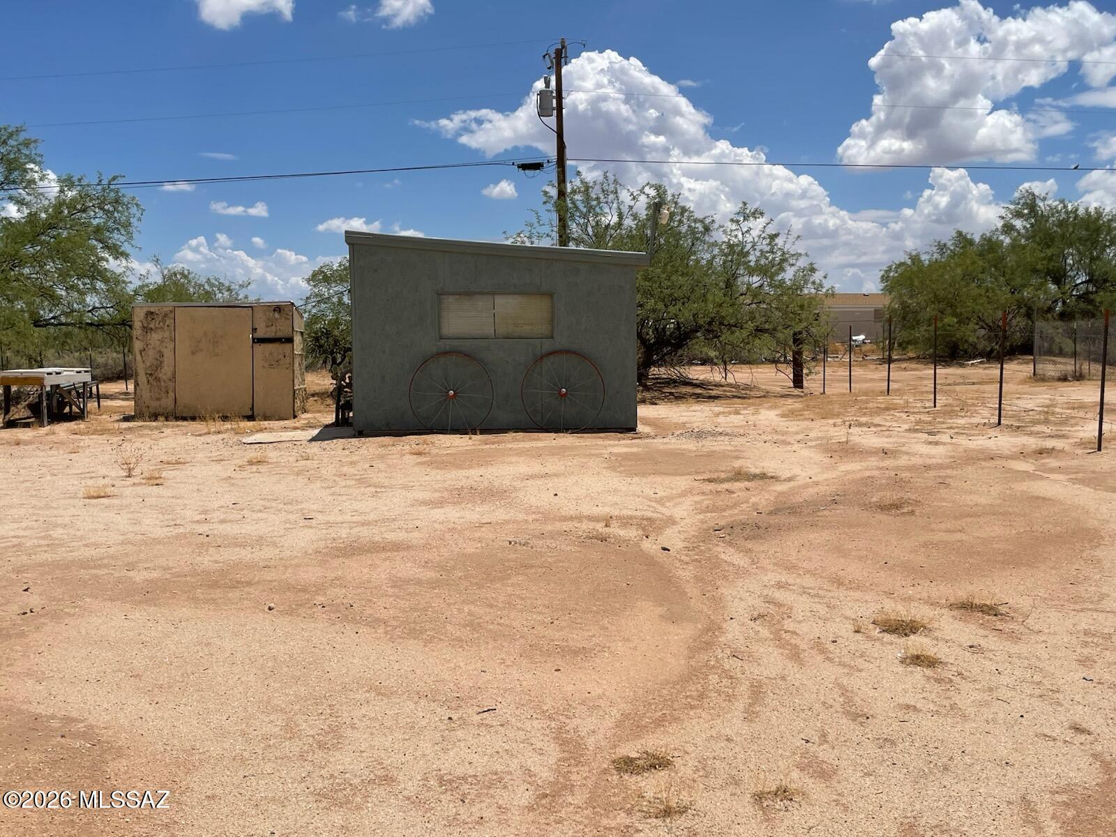 8535 South Marstellar Road Tucson, AZ 85736 - Photo 15 of 30 Building with wagon wheels