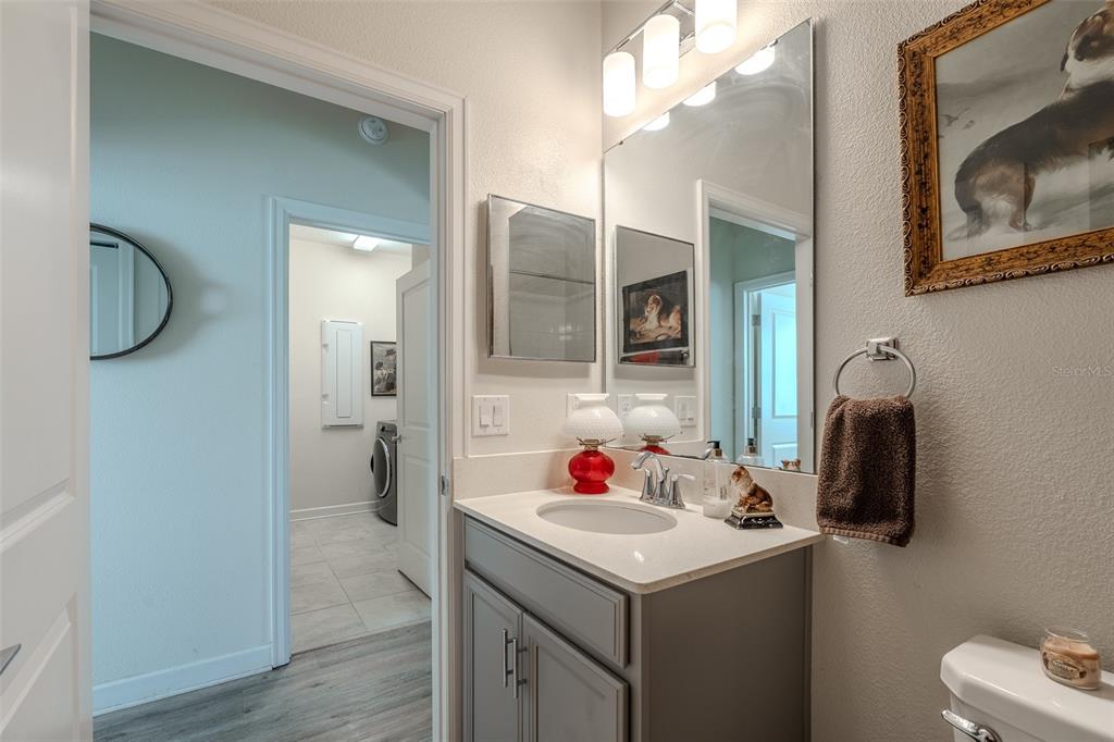 9224 Southwest 60th Ct Road Ocala, FL 34476 - Photo 39 of 55 a bathroom with a sink vanity and mirror