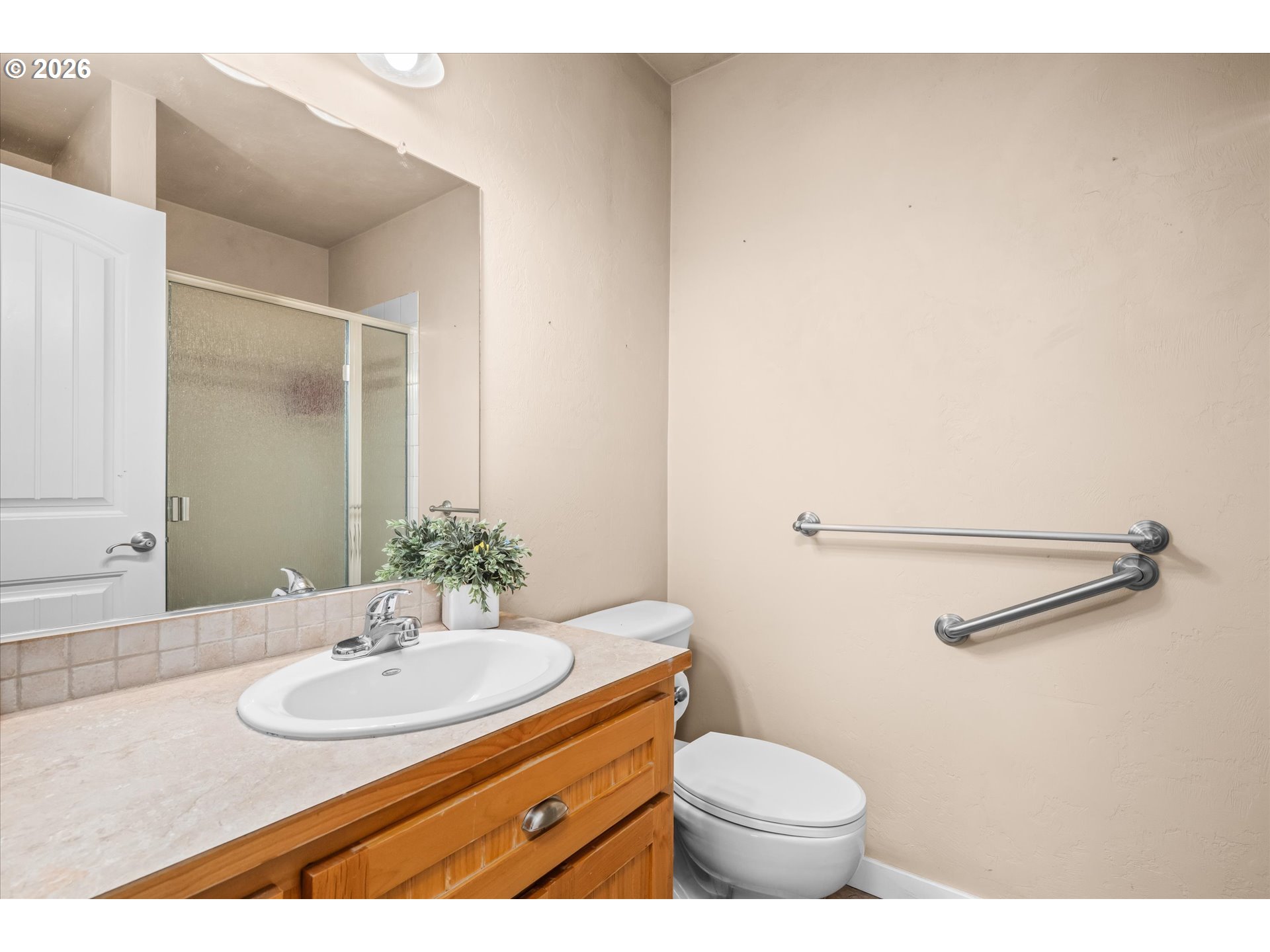 277 South 67th Court Springfield, OR 97478 - Photo 26 of 44 a bathroom with a sink and a toilet