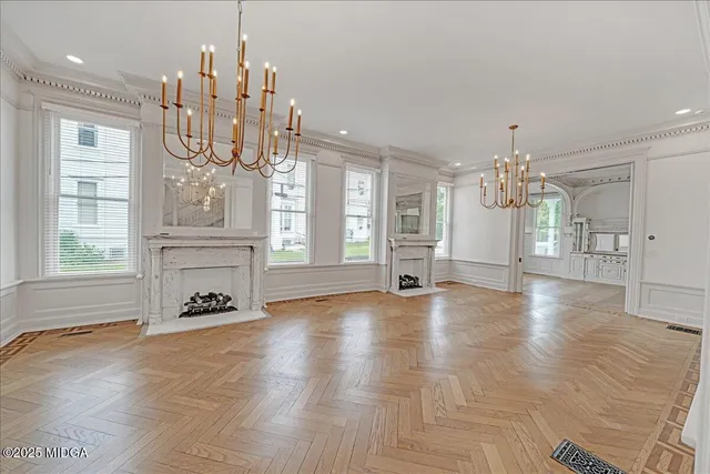 a kitchen with granite countertop a stove and a refrigerator