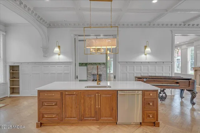a view of entryway with wooden floor and stairs