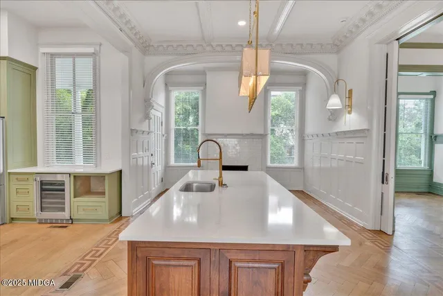 an aerial view of a house with a yard and garden