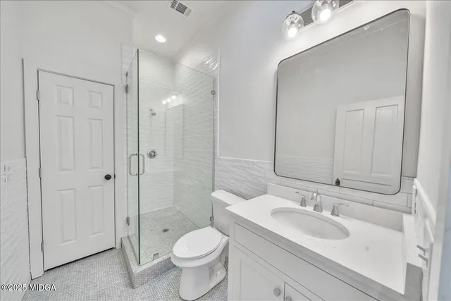 front view of the house with potted plants