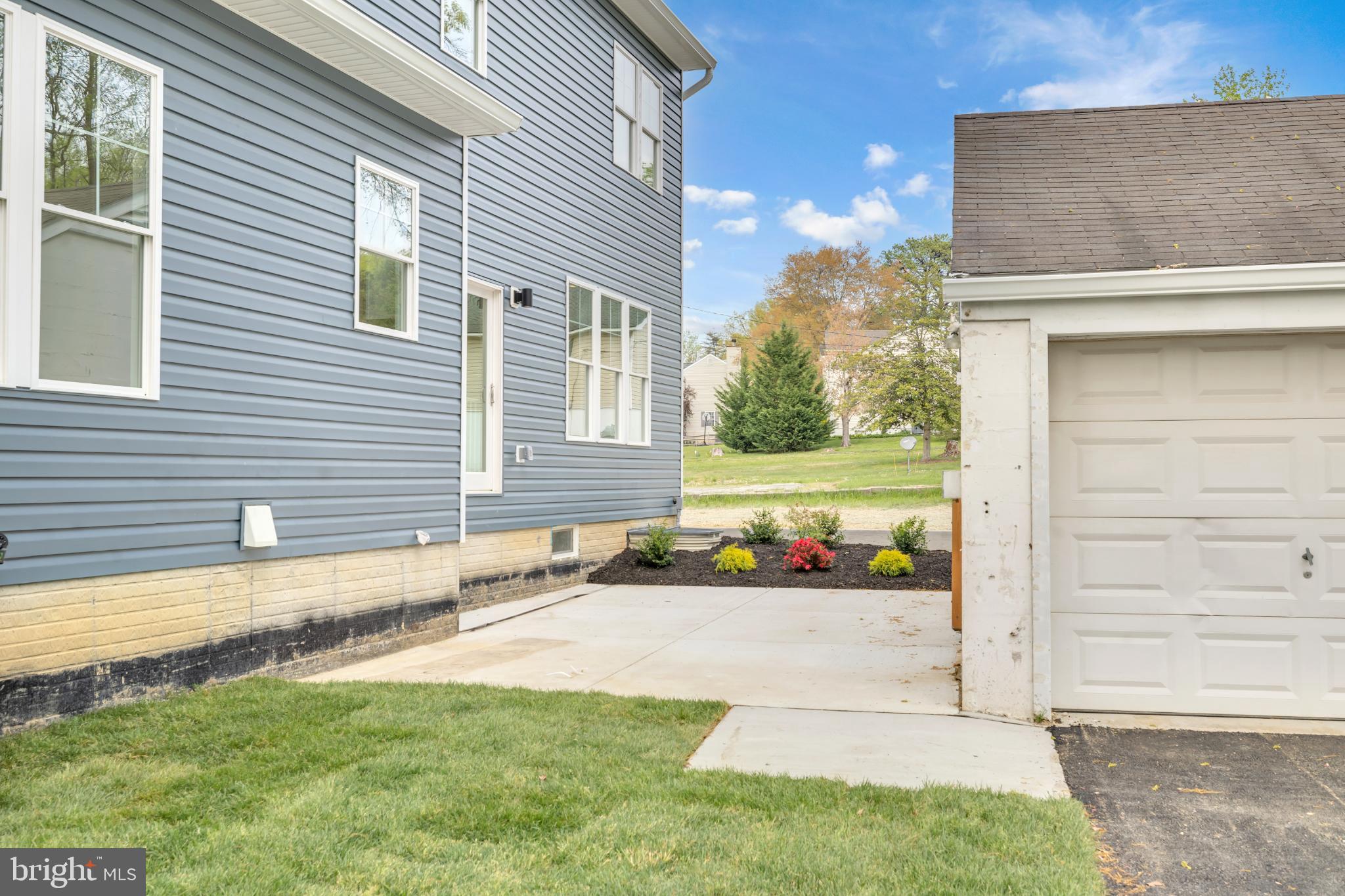 413 Trimble Road Joppa, MD 21085 - Photo 45 of 54 Charming exterior with lush landscaping.