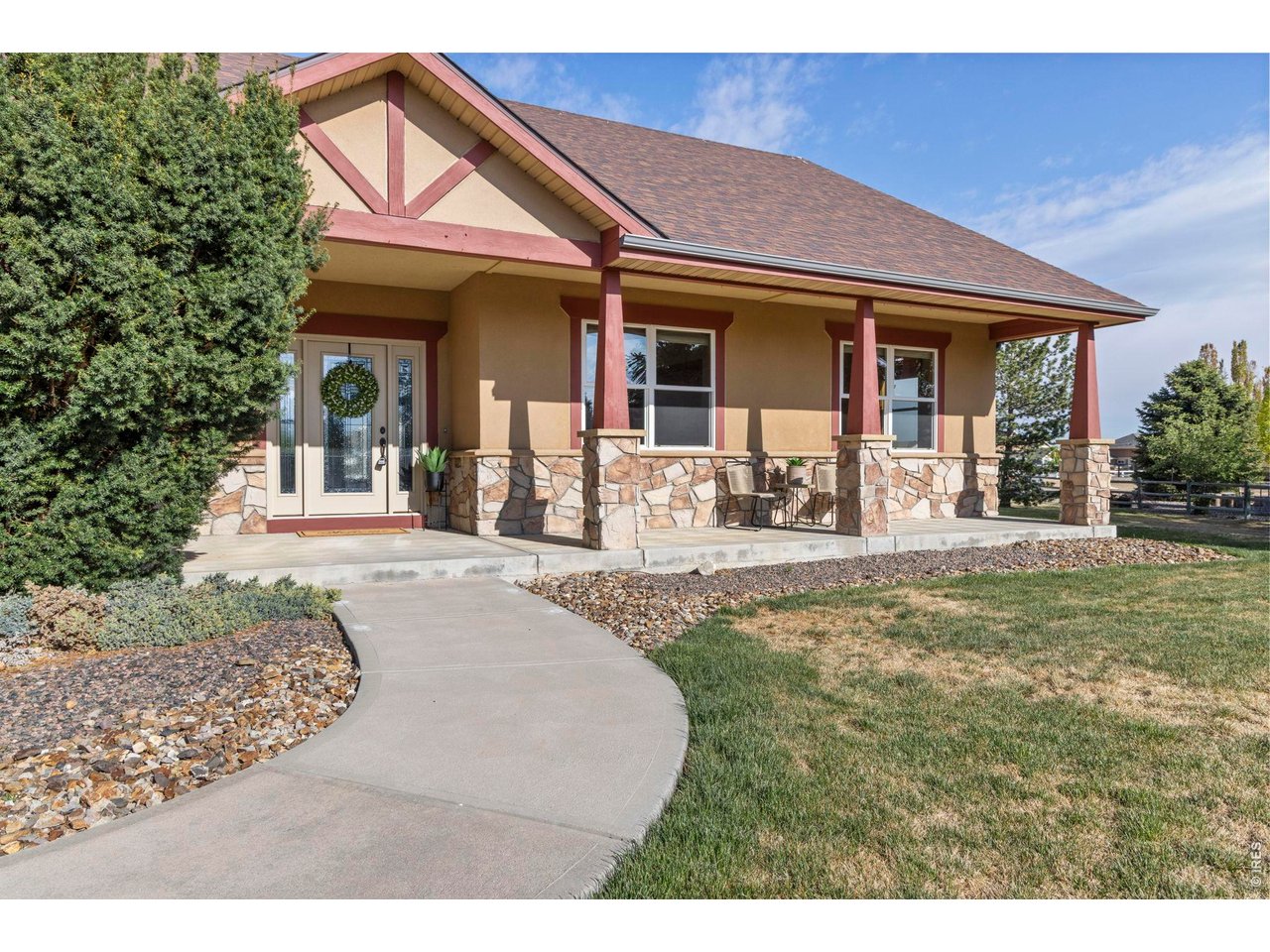 1405 Fox Ridge Parkway Severance, CO 80550 - Photo 5 of 43 Wonderful Colorado Style Stone and Wood Trim