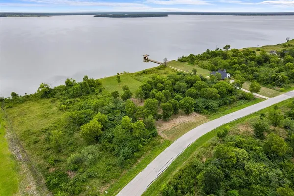 a view of a garden with a lake