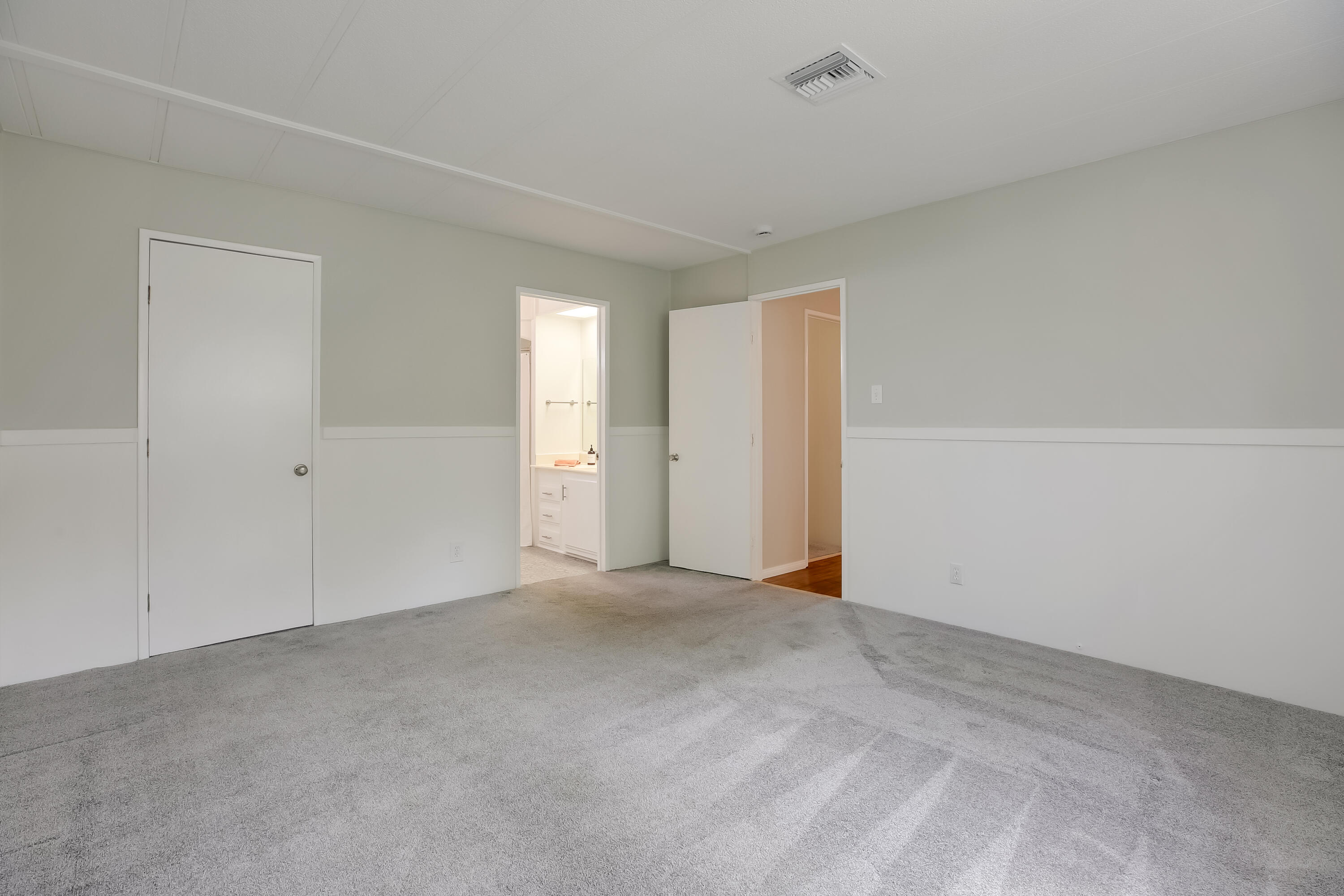 6180 Via Real, Unit 2 Carpinteria, CA 93013 - Photo 15 of 38 Primary bedroom w/walk-in closet