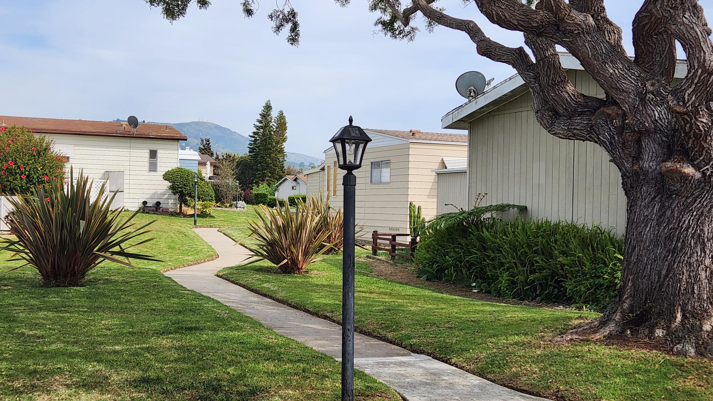 6180 Via Real, Unit 2 Carpinteria, CA 93013 - Photo 32 of 38 A greenbelt walkway