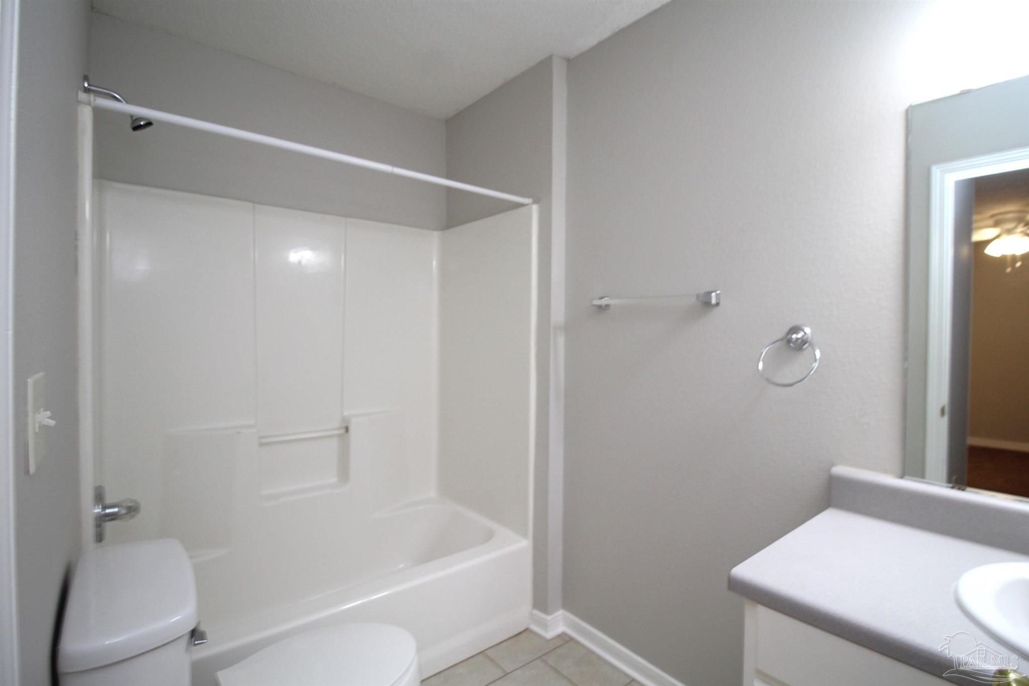 7135 Pearson Road, Unit 7 Pensacola, FL 32526 - Photo 12 of 14 a bathroom with a sink and a toilet